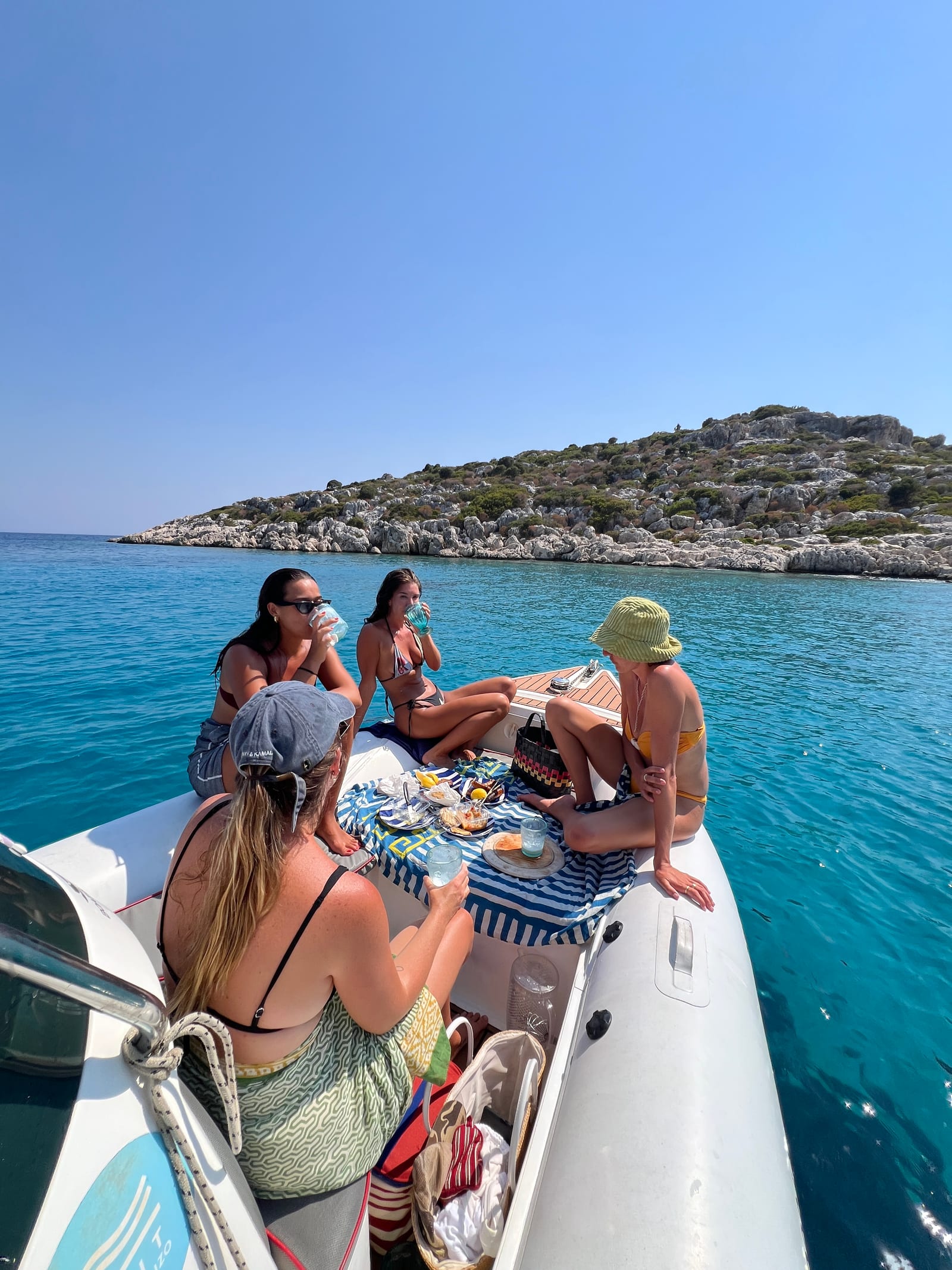 A picnic spread on the bow of the boat at anchor